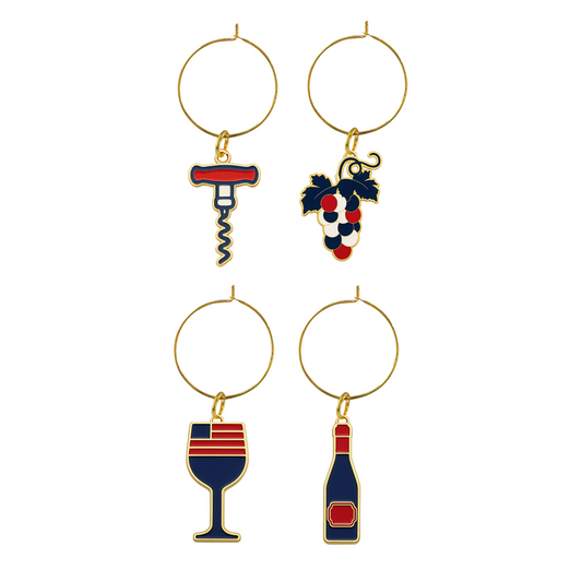 A set of four *FOX News* Wine Glass Charms with the network logo displayed in a premium black gift box on a clean kitchen counter.