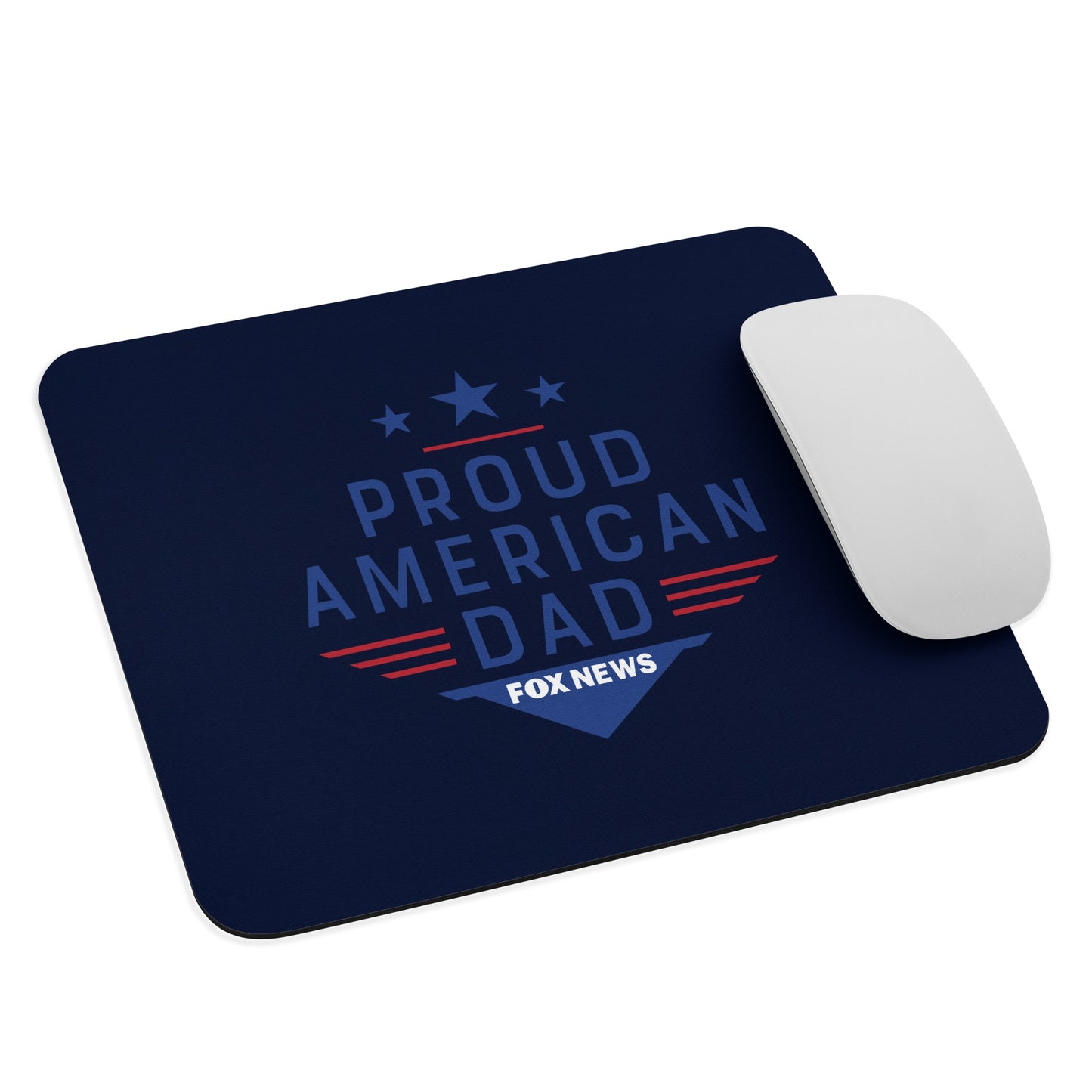 A lifestyle shot of a suburban father using the FOX News mouse pad in his home study during a morning coffee session.