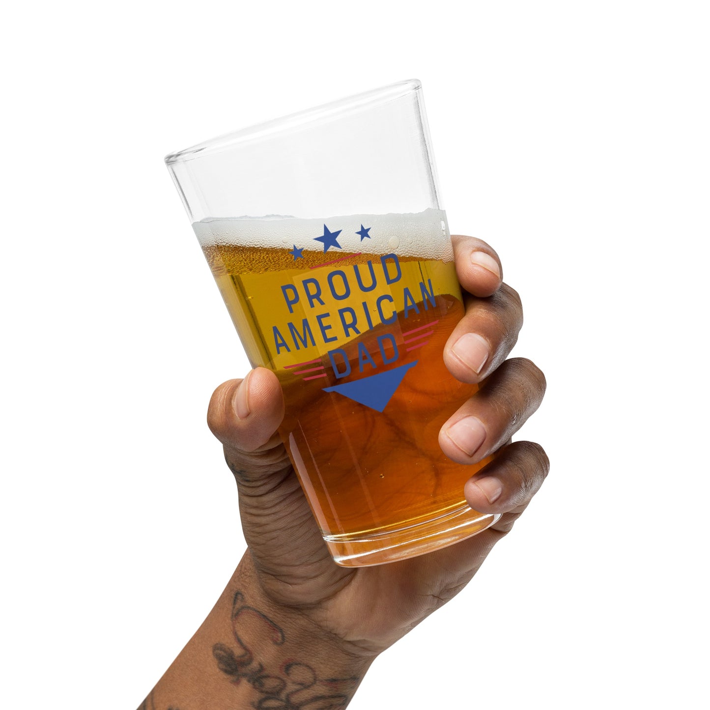 A FOX News viewer enjoying a cold beverage in the Proud American Dad Pint Glass in a backyard setting.