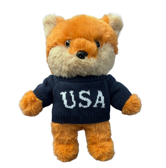 Official FOX News For All America Fox Plush shown in a bright, clean American living room setting.
