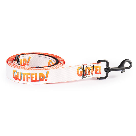 Official Gutfeld! logo pet leash displayed on a clean suburban American front porch.