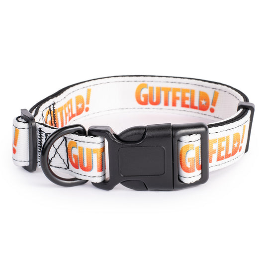 A crisp, clean product shot of the Gutfeld pet collar featuring bold FOX News branding against a modern American suburban living room background.