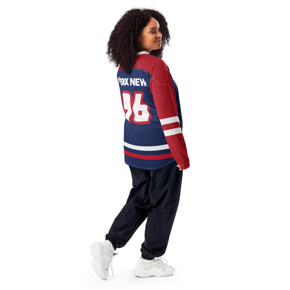 The FOX News hockey jersey shown from the back in a modern lifestyle context reflecting the American heartland.