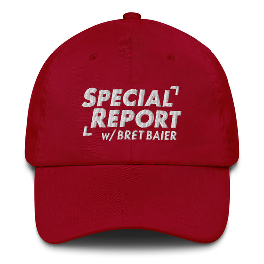 A modern American living room setting featuring the FOX News Special Report with Bret Baier embroidered hat resting neatly on a wooden coffee table.