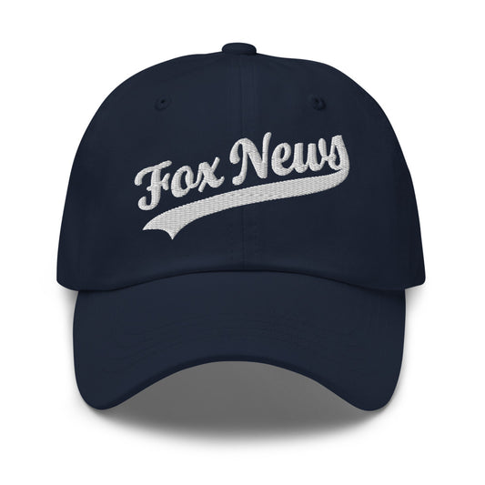 A proud American man wearing the FOX News Sports Logo Dad Hat in a bright suburban backyard setting.