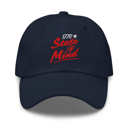 A crisp front view of the FOX News 1776 State Of Mind embroidered dad hat resting in a bright, modern American living room setting.