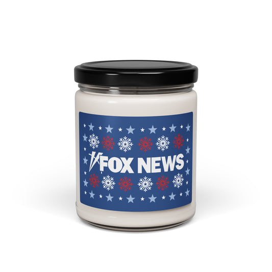 A cozy, modern American living room decorated for the holidays with a FOX News holiday snowflakes scented candle sitting on a wooden coffee table.