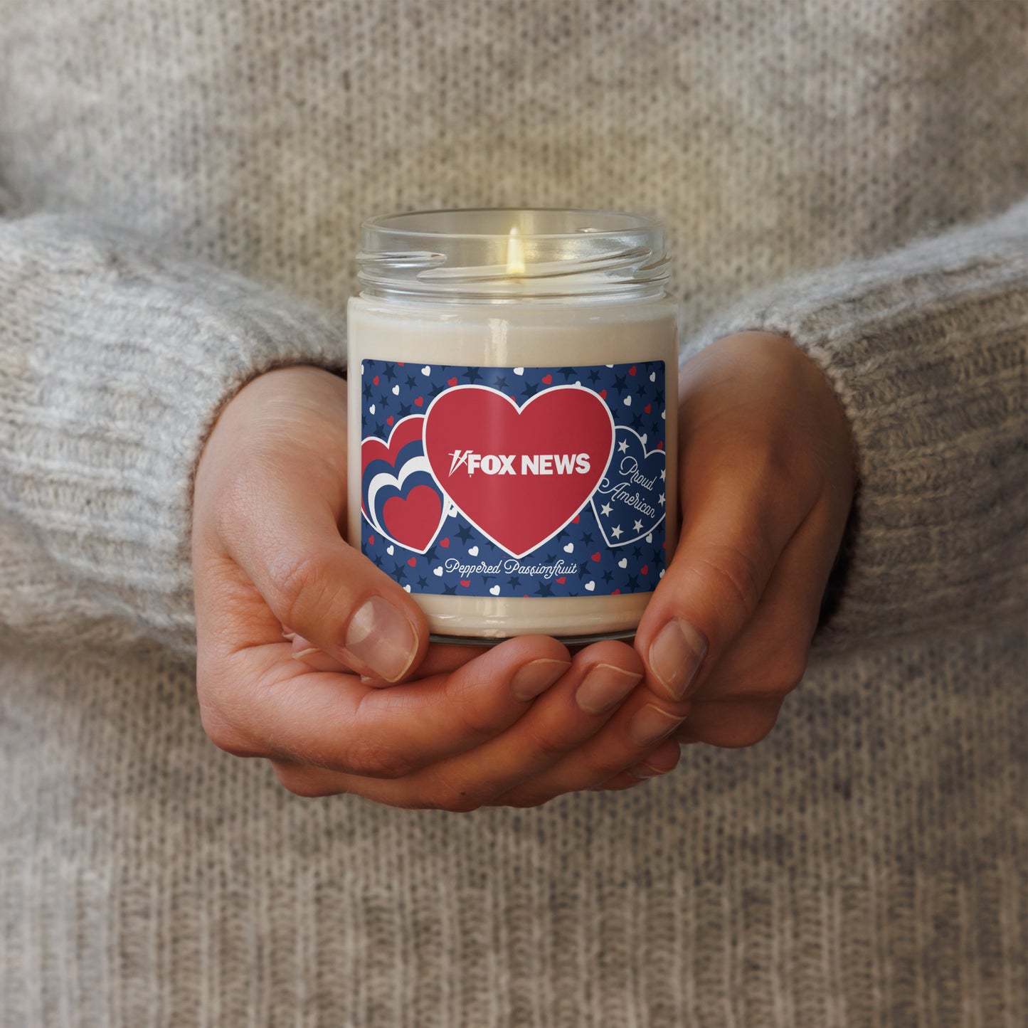 Close-up of the Peppered Passionfruit 9oz candle from the official FOX News Shop collection.