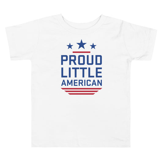 A white toddler t-shirt featuring the FOX News Proud Little American graphic in a clean American home setting.