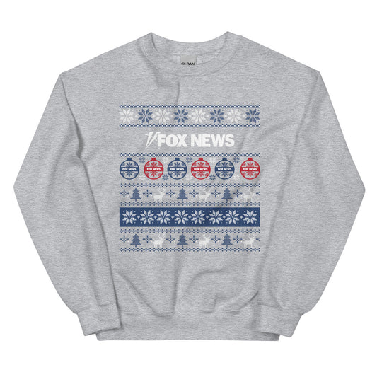 A Sport Grey FOX News Holiday Crewneck Sweatshirt featuring a festive network logo in a clean, modern American living room setting.