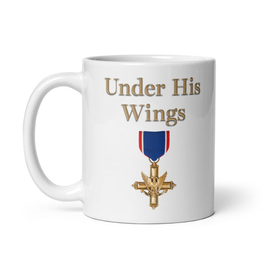A crisp white ceramic mug featuring the FOX News Under His Wings design by Emily Compagno, displayed on a clean modern American kitchen counter.