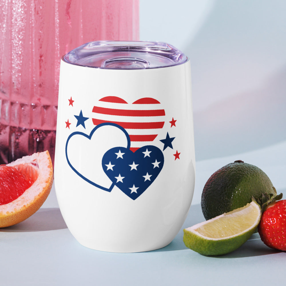 The FOX News Hearts Wine Tumbler displayed next to a bottle of wine in a modern American kitchen.