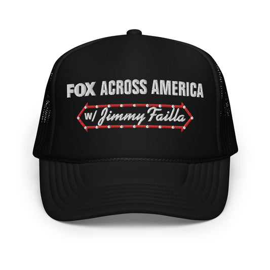 A black FOX Across America with Jimmy Failla Trucker Hat featuring the official show logo on the front panel, displayed in a clean American suburban setting.