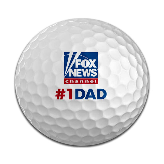 A set of six FOX News Dad golf balls arranged neatly in a modern American suburban home setting.
