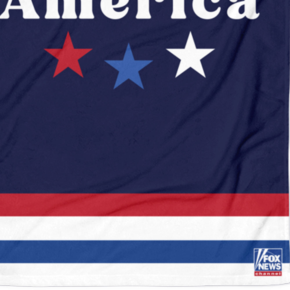 Detailed view of the crisp FOX News logo on the red, white, and blue America beach towel.