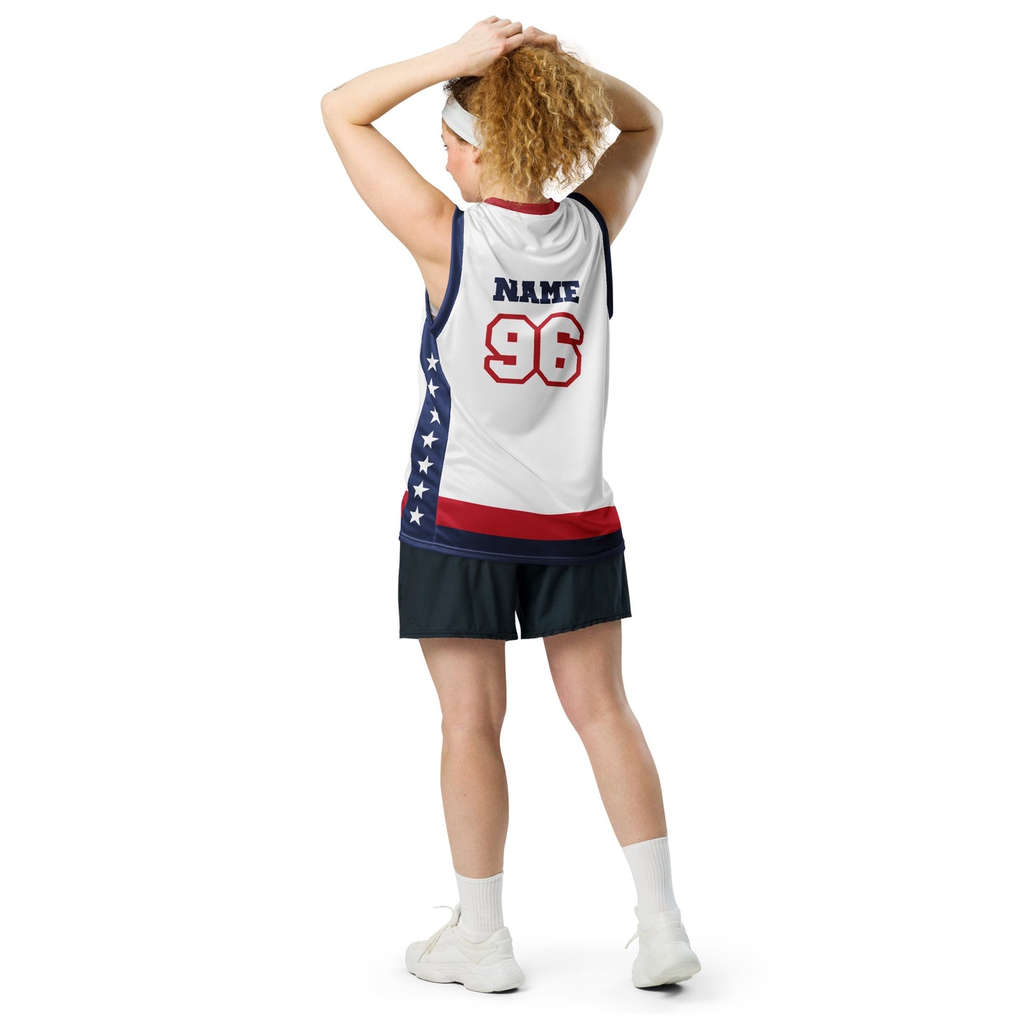 A patriotic fan wearing the *FOX News* jersey while holding a basketball in an outdoor park.