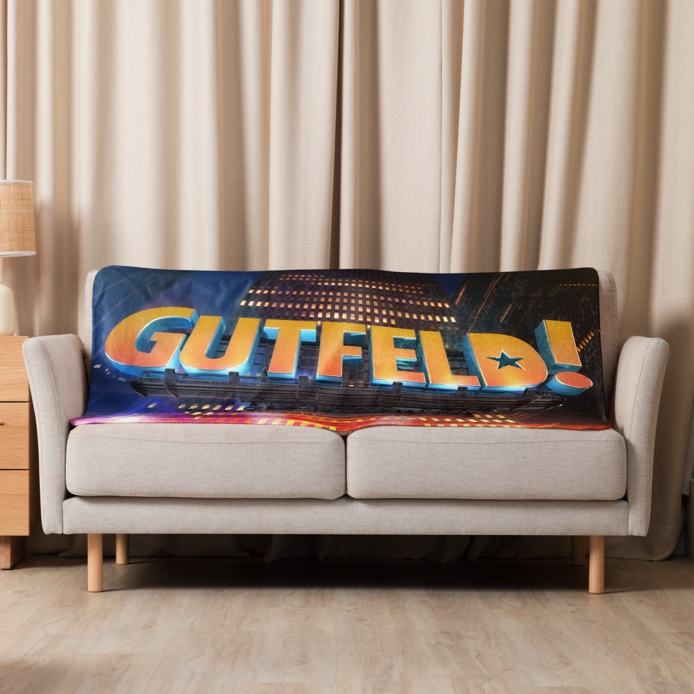 Close-up detail of the ultra-soft Sherpa fleece texture and clear embroidered-style Gutfeld! logo on the premium throw blanket.