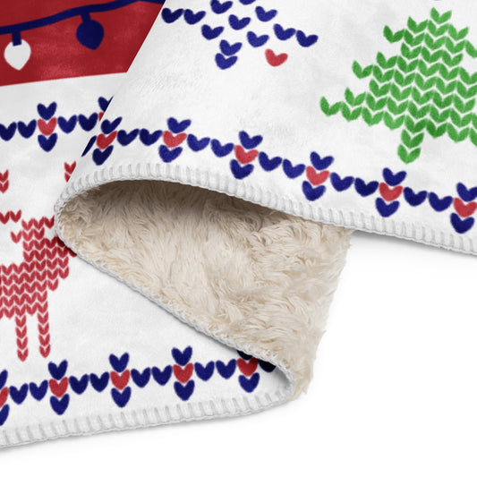 A cozy modern American living room featuring the FOX News Holiday Sherpa Blanket draped over a comfortable sofa.-3