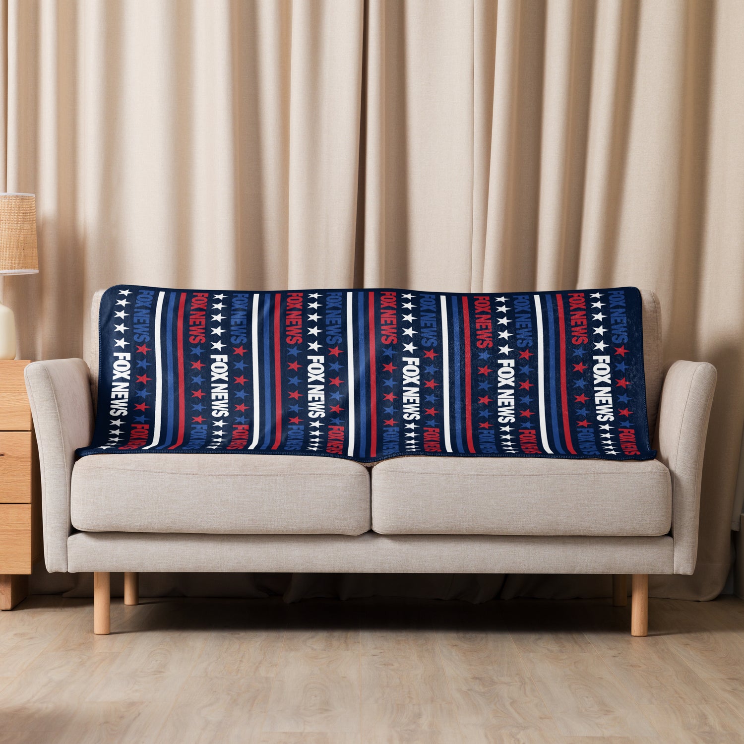 The FOX News sherpa blanket laid out flat to showcase its generous size and premium fleece finish.