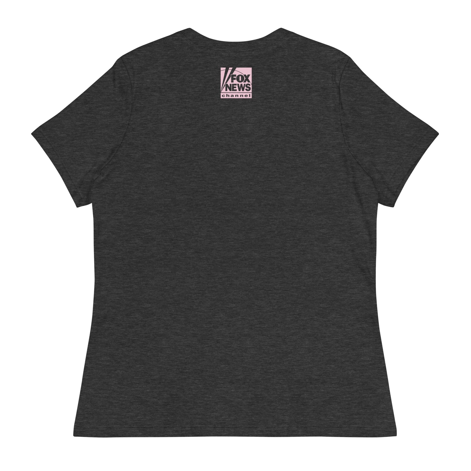 A woman representing the core FOX News audience wearing the Heather Mauve t-shirt in a comfortable, bright home setting.