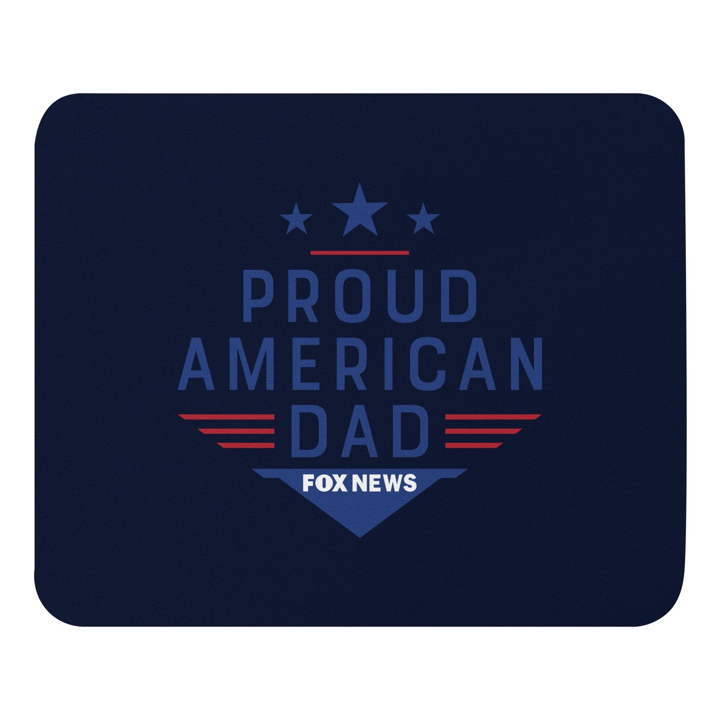 A FOX News Proud American Dad Mouse Pad sitting on a clean, modern American home office desk next to a computer mouse.