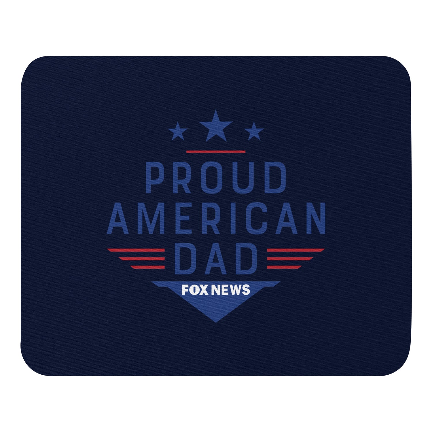 A FOX News Proud American Dad Mouse Pad sitting on a clean, modern American home office desk next to a computer mouse.