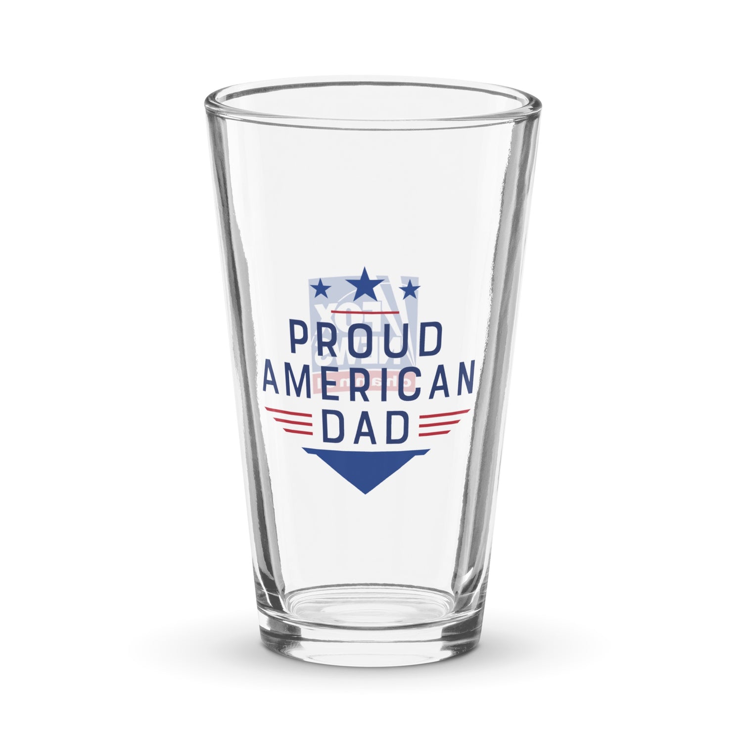 A patriotic FOX News Proud American Dad Pint Glass sitting on a clean wooden table in a suburban American home.