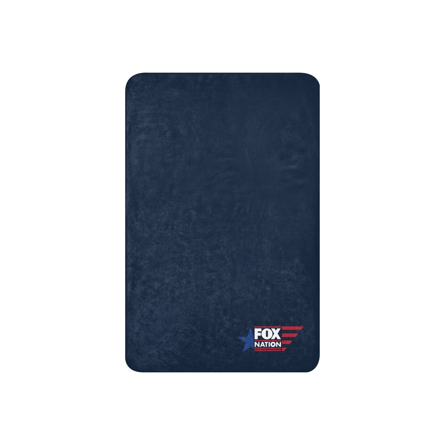 Lifestyle view of the FOX Nation throw blanket showcasing its thick, warm texture and bold branding.