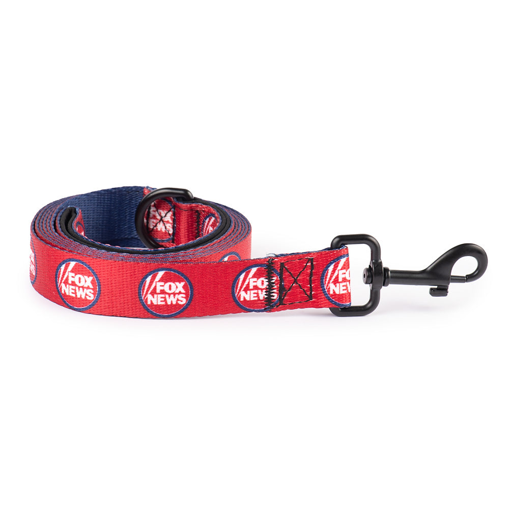 A durable 6-foot FOX News pet leash featuring the iconic network logo in a clean American suburban setting.