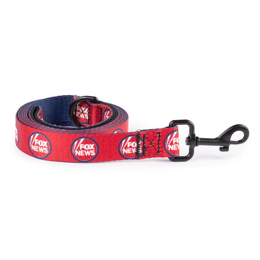 A durable 6-foot FOX News pet leash featuring the iconic network logo in a clean American suburban setting.
