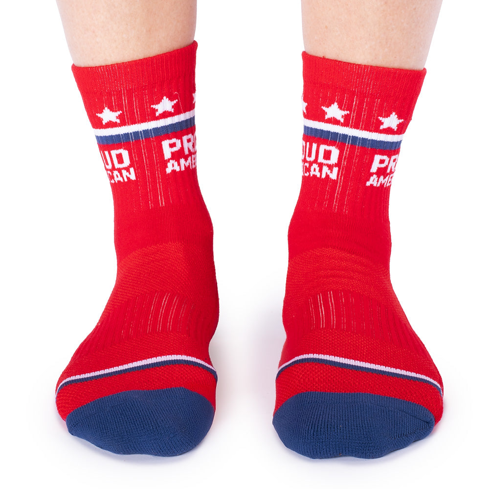 An overhead view of the *Proud American* socks showing the vibrant red color and stitching.