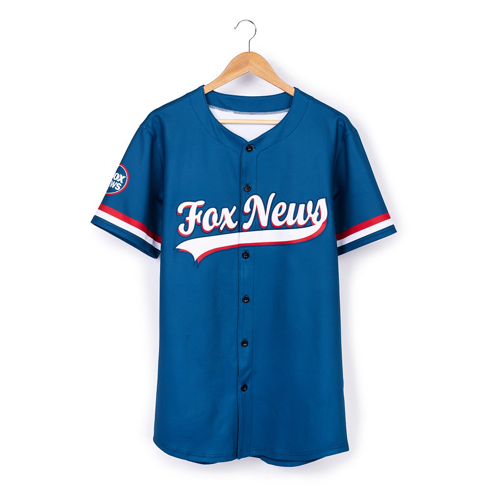 Detailed view of the FOX News logo on the chest of the blue sports jersey.