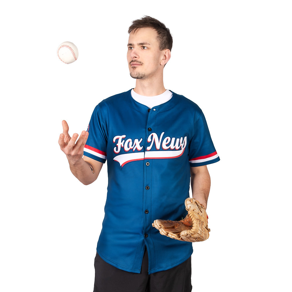 A loyal fan proudly wearing the FOX News jersey at a community gathering.