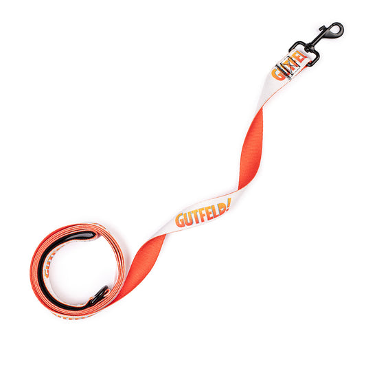 Close-up view of the sharp Gutfeld! logo printed on the durable 6-foot pet leash.