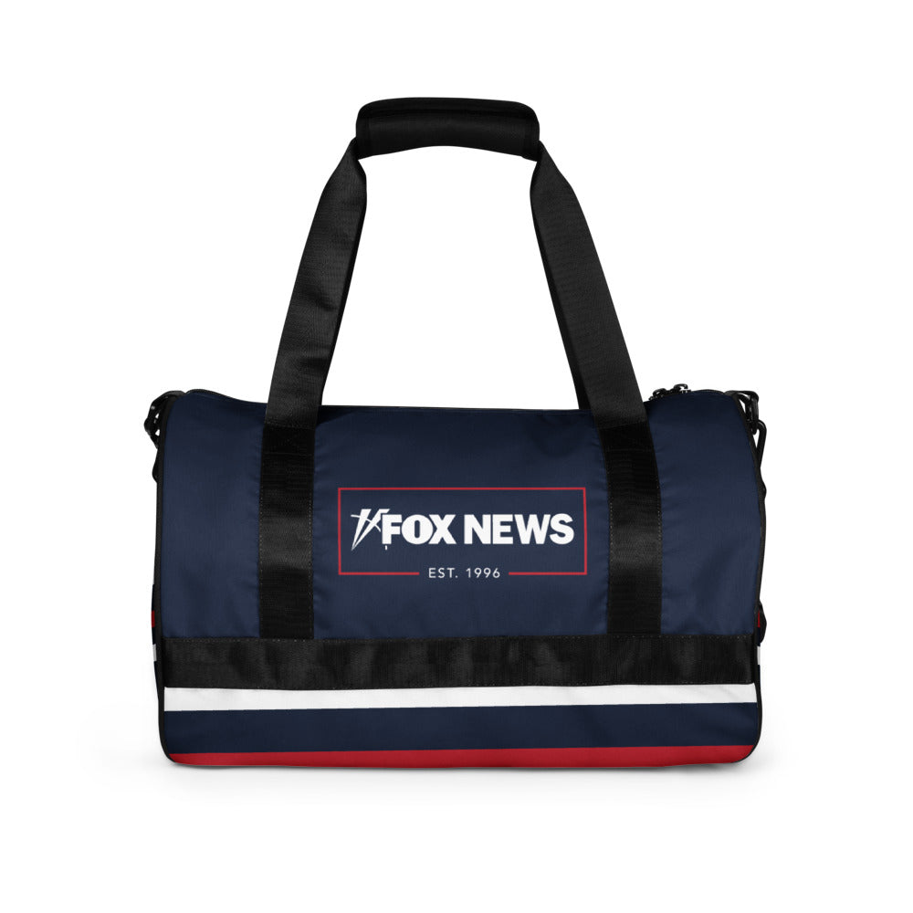 A clean modern American gym locker setting displaying the FOX News Logo Gym Bag on a bench.