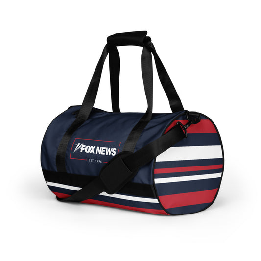 Close-up of the crisp FOX News logo on the durable fabric of the workout duffel bag.