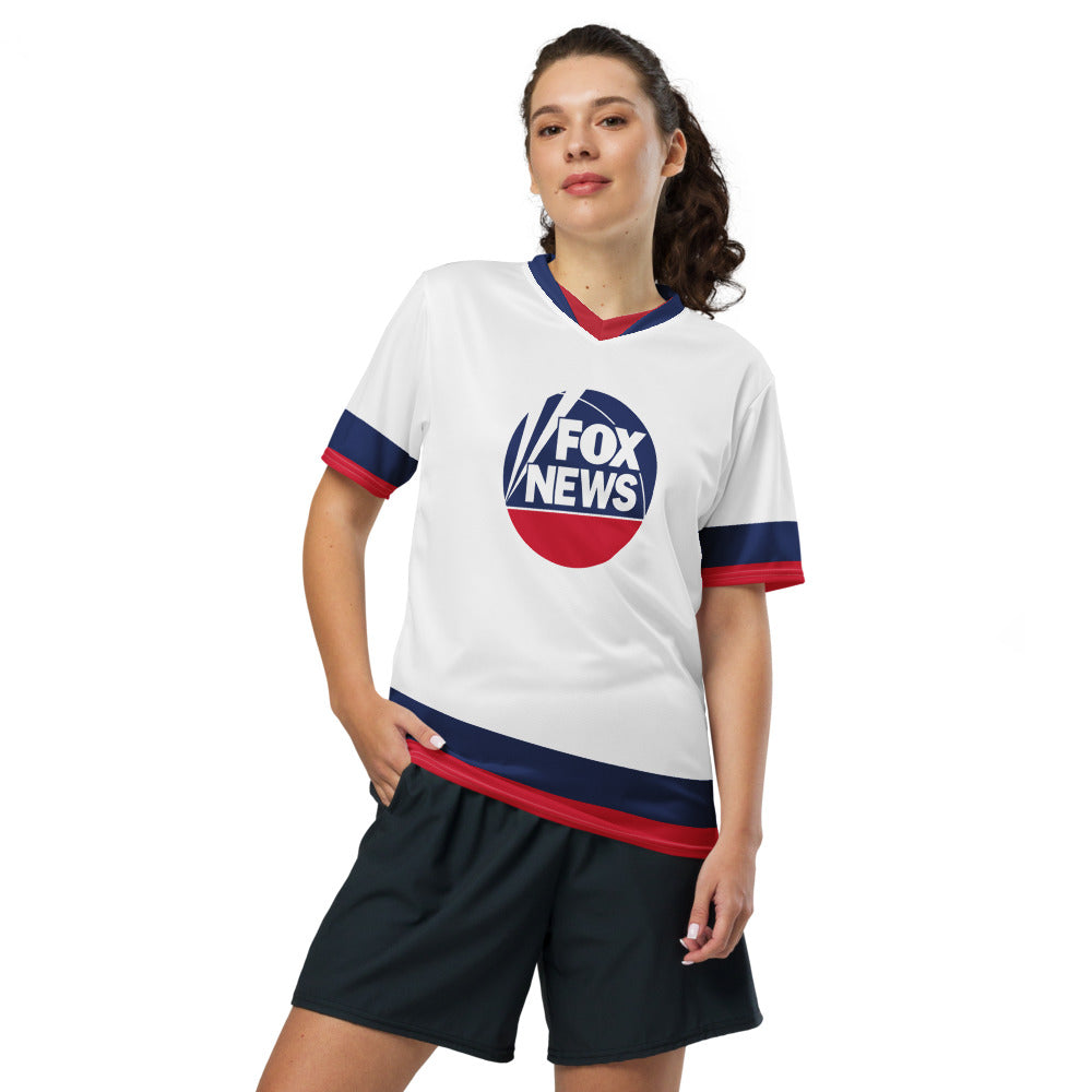 A folded display of the FOX News logo sports jersey highlighting premium stitching and official network branding.