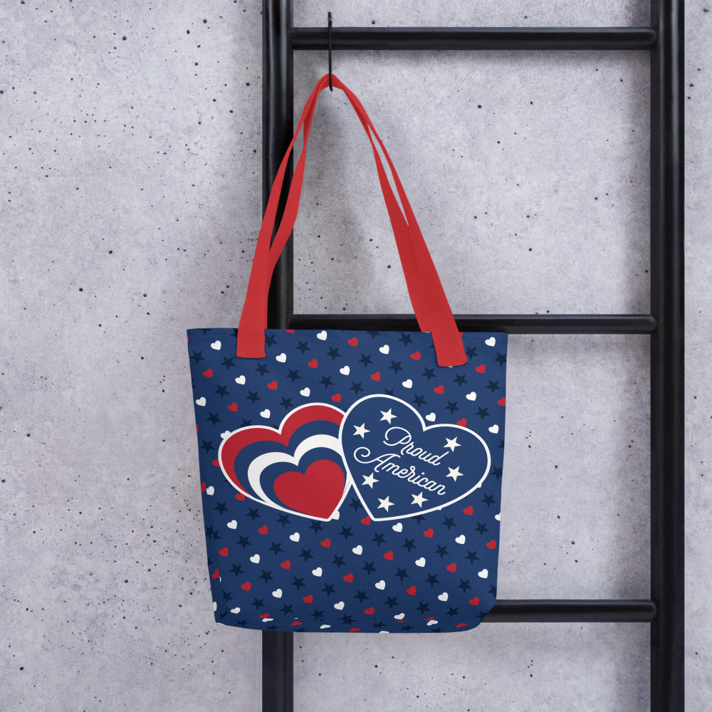 The 15x15 FOX News Hearts and Stars tote bag displayed on a clean wooden table next to a morning coffee mug.