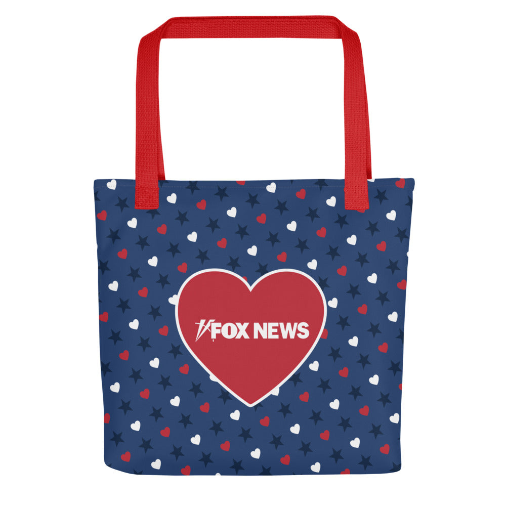 A patriotic FOX News Proud American Hearts And Stars Tote Bag featuring red, white, and blue patterns in a bright American home setting.