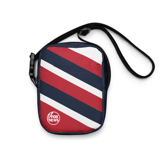 A FOX News Logo Crossbody Bag shown in a clean and modern American home setting.