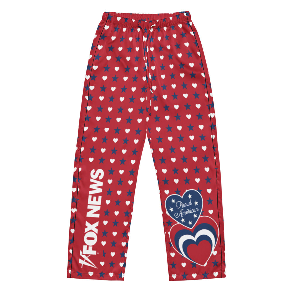 A modern American living room featuring a pair of FOX News Proud American pajama pants neatly folded on a comfortable couch.