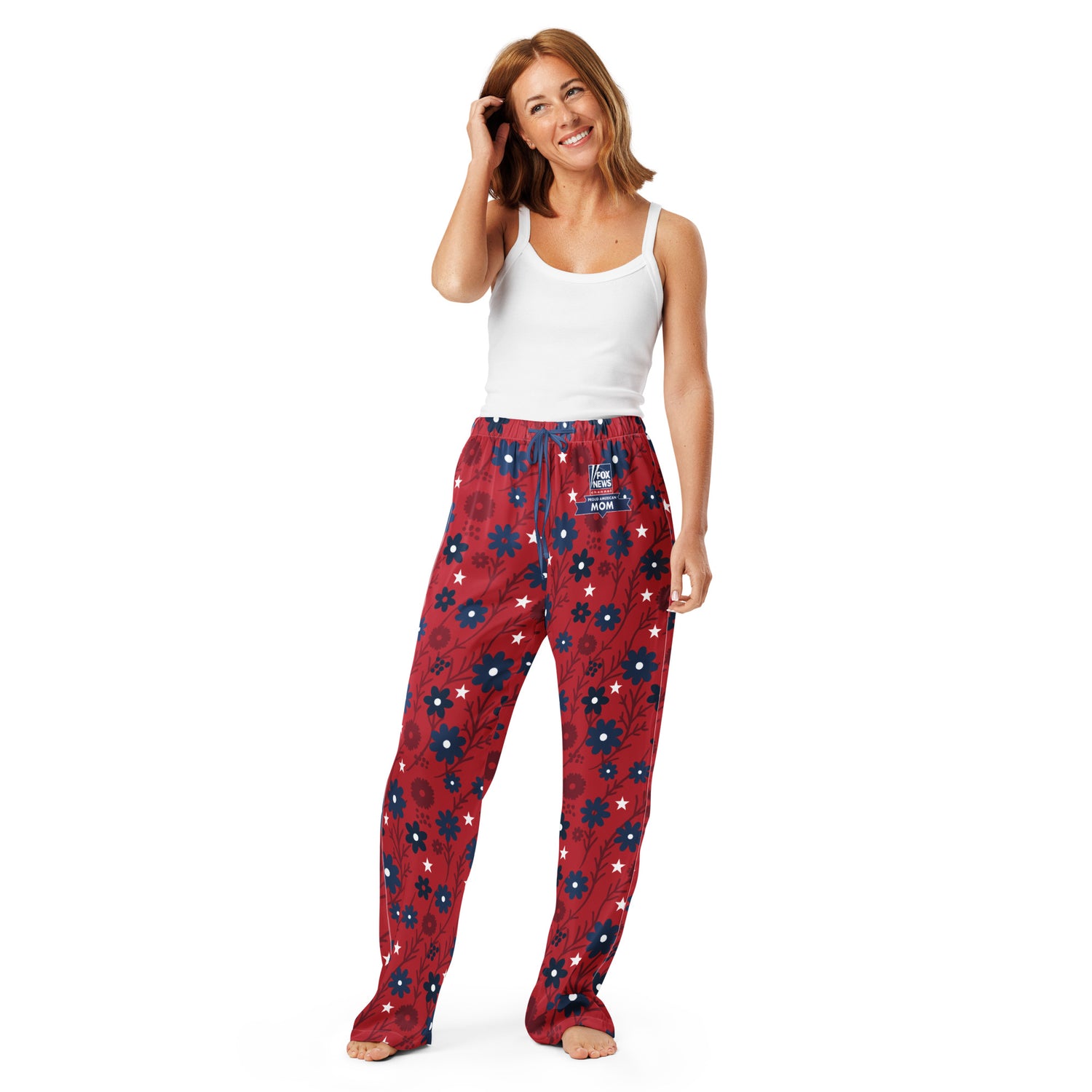 Close-up of the FOX News logo and Proud American Mom graphic on the soft fabric of the pajama pants.