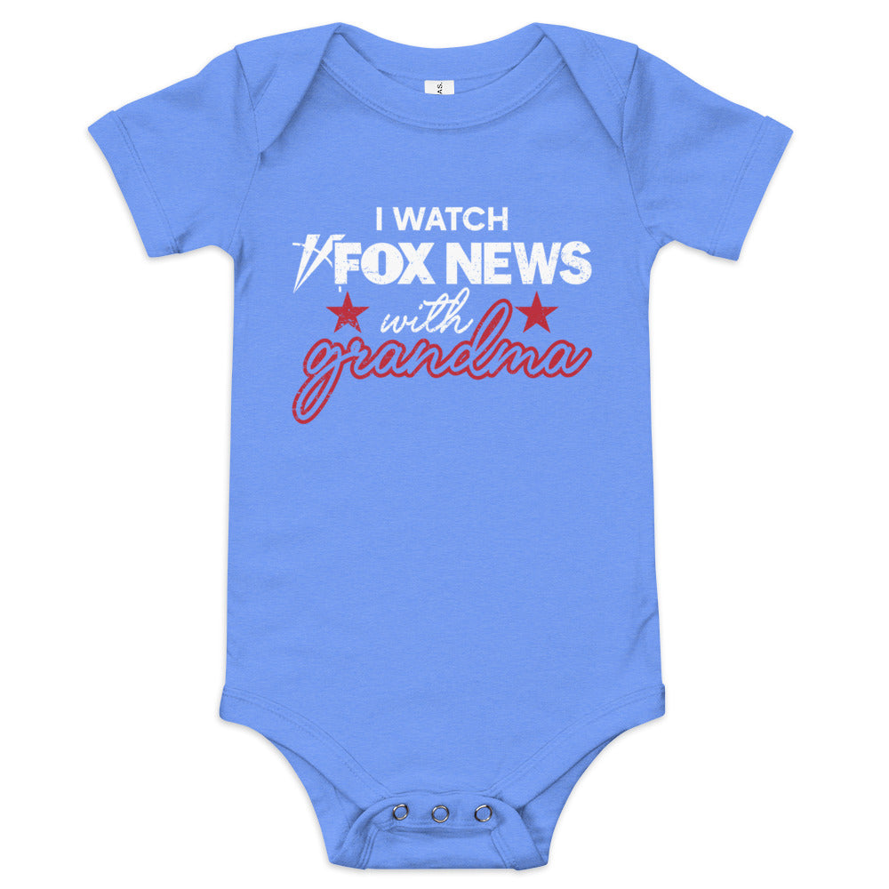 Close up of the crisp FOX News logo and blue text graphic on a soft heather grey baby one-piece.