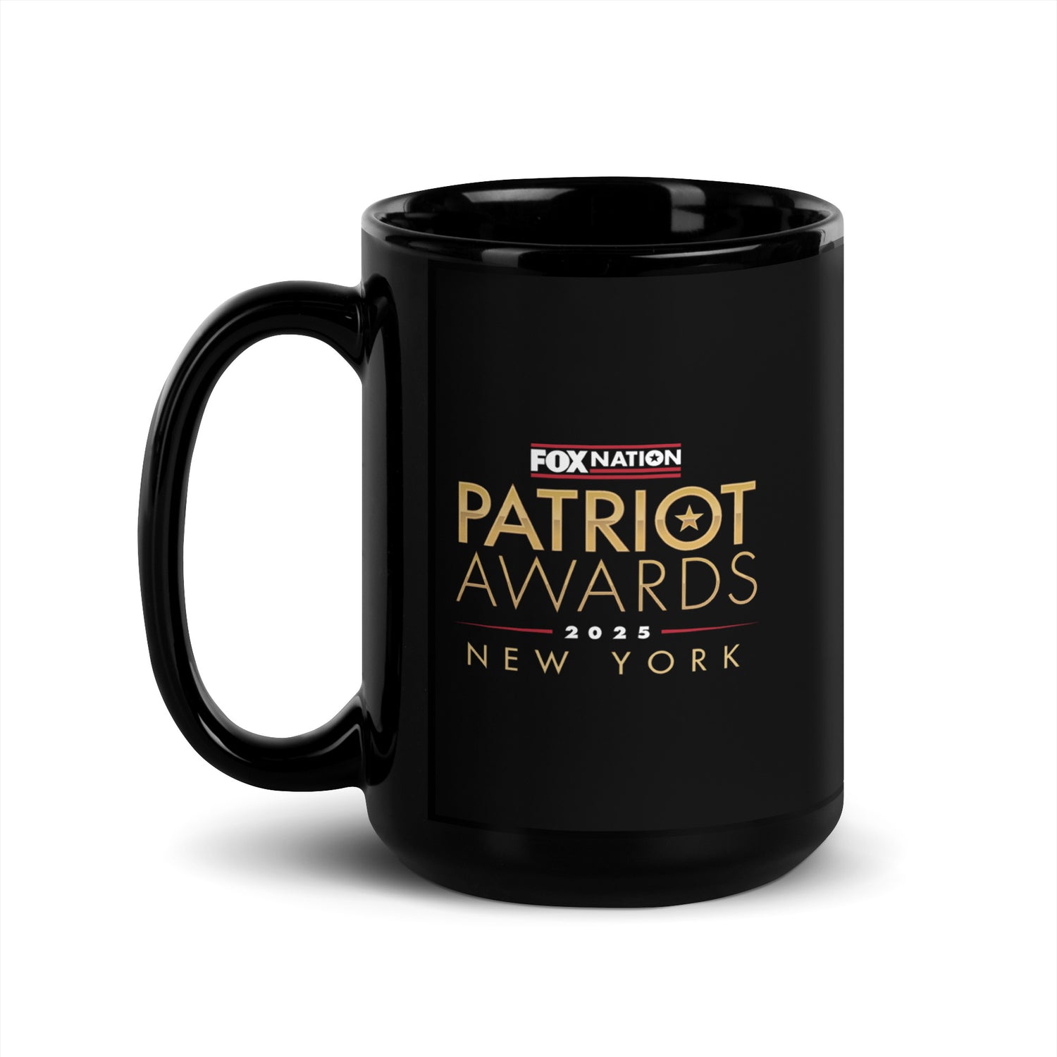 A 15 oz *FOX Nation* Patriot Awards mug filled with coffee in a sunlit breakfast setting.
