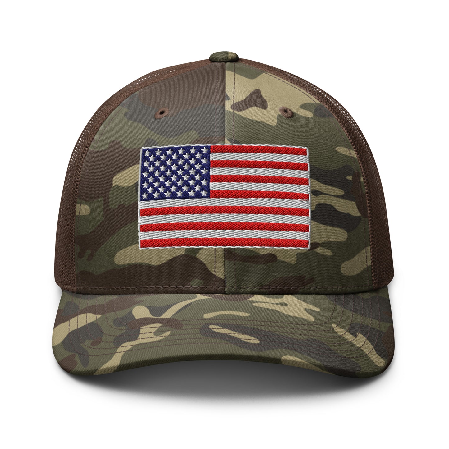 Front view of the FOX News Flag Camo Trucker Hat featuring a patriotic flag and camo design with the FOX News logo in a clean American living room setting.