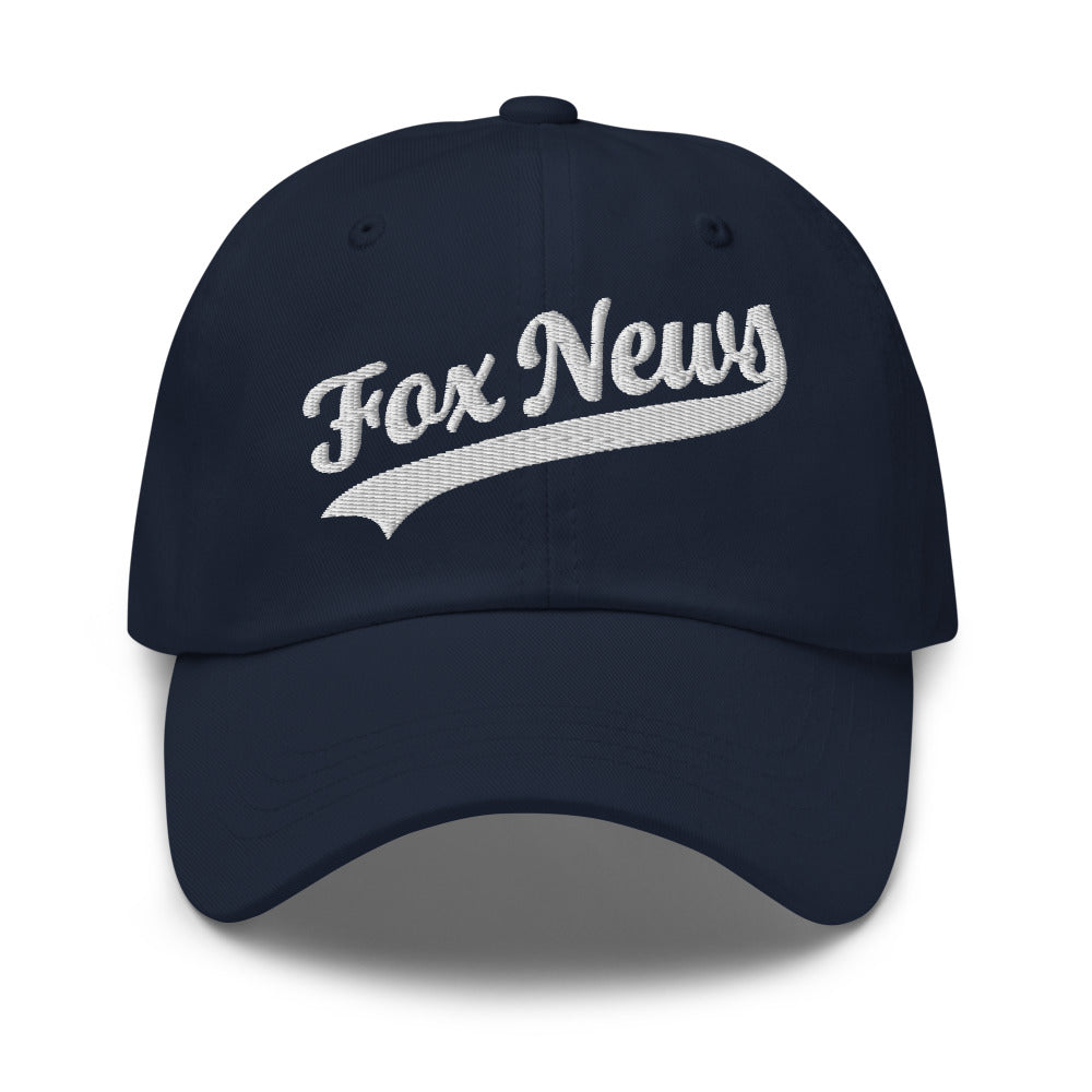 A proud American man wearing the FOX News Sports Logo Dad Hat in a bright suburban backyard setting.
