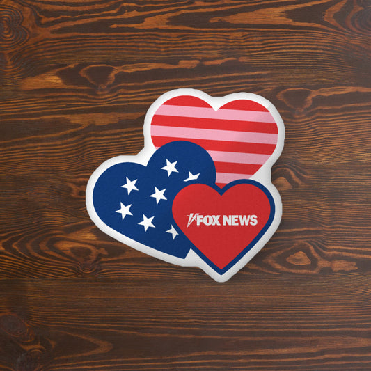 Detailed view of the crisp *FOX News* logo and heart graphics on a high-quality white throw pillow.