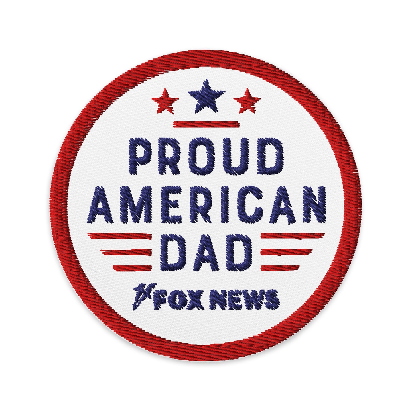 The circular FOX News Proud American Dad patch displayed proudly on a classic navy jacket in a bright American living room setting.