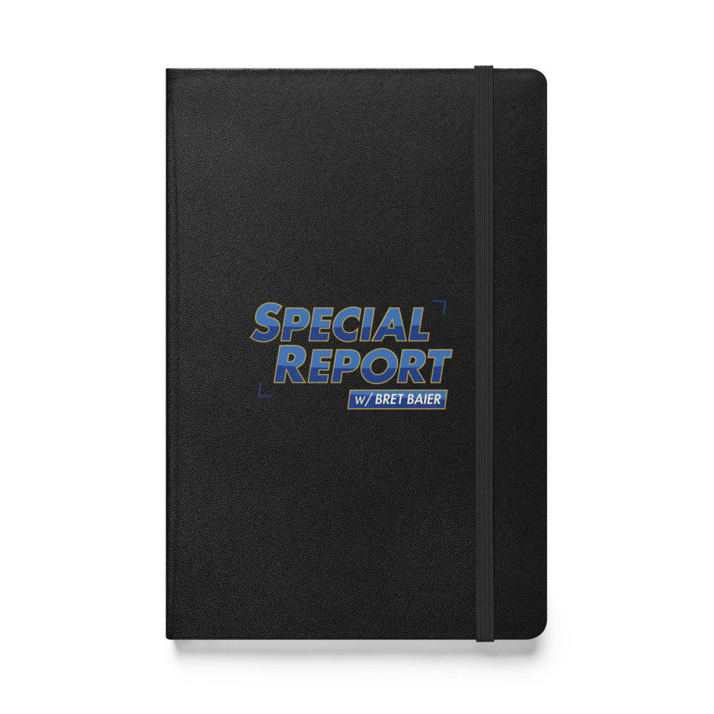 A high-quality black hardcover notebook featuring the FOX News Special Report with Bret Baier logo, placed on a clean wooden desk in a modern American home office setting.