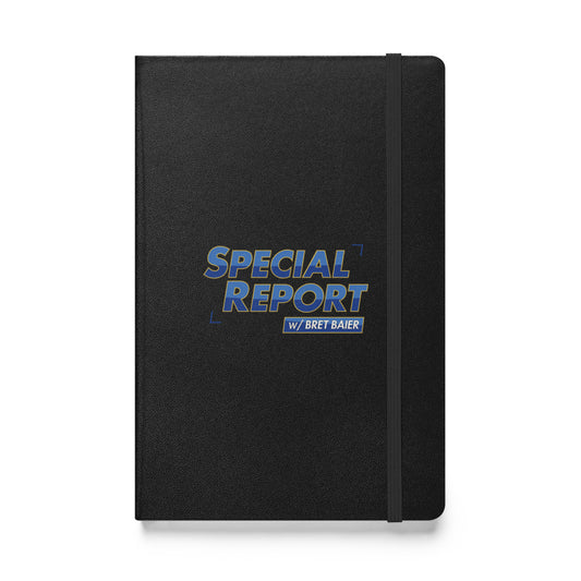 A high-quality black hardcover notebook featuring the FOX News Special Report with Bret Baier logo, placed on a clean wooden desk in a modern American home office setting.